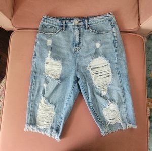 Knee length distressed shorts